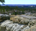 PICTURES/El Morro Natl Monument - Headland/t_Woman on Cliff1.JPG